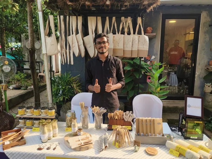 A Plastic Free Madras expo stall with cloth bags, bamboo cutlery and compostable tableware